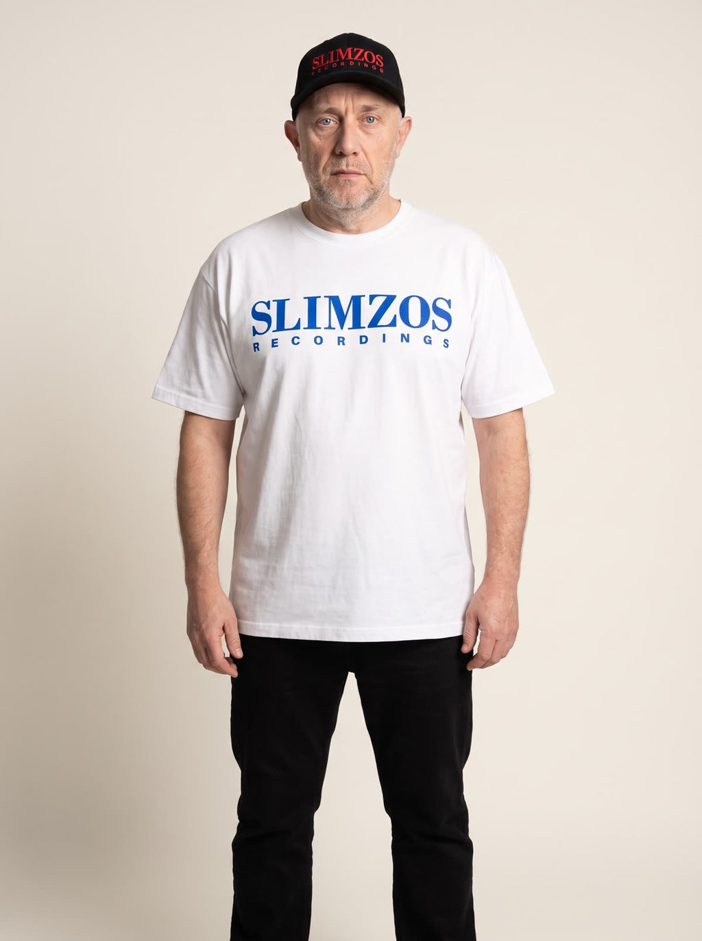 Slimzee wearing the white/blue Slimzos tee