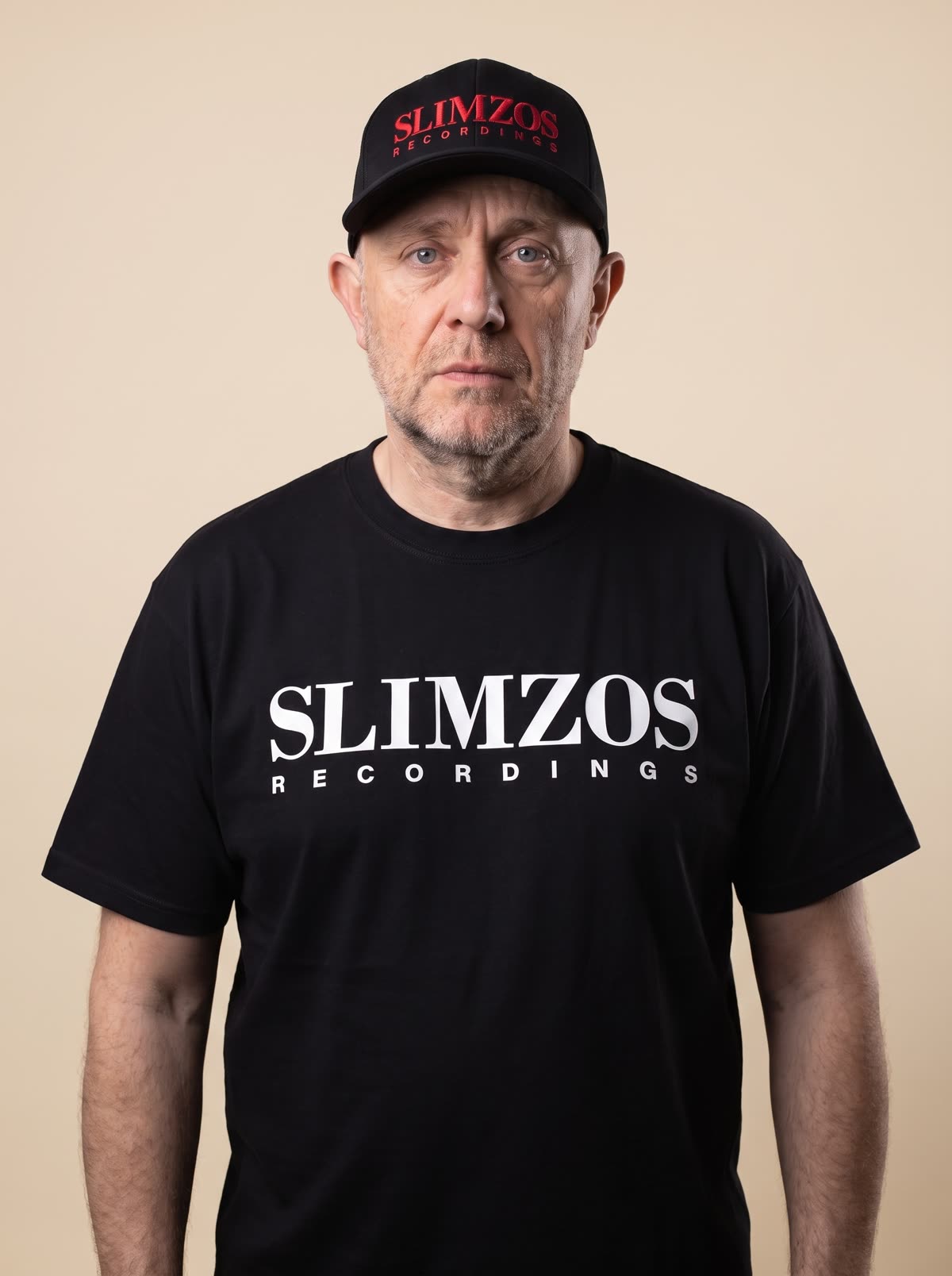 Slimzee wearing the black Slimzos tee, white print